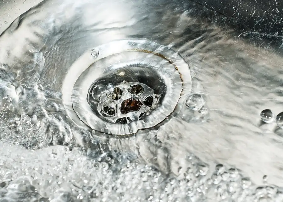 water running down a cleared drain, plumbing services - clinton illinois